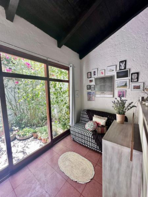 Acogedora casita céntrica con parqueo